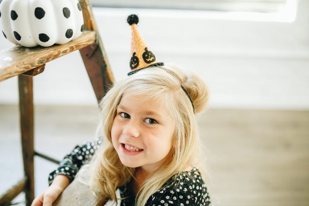 Halloween photo shoot with little blue olive party hats 