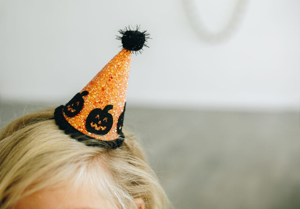 Halloween photo shoot with little blue olive party hats 