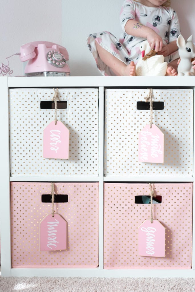 Pink and White Striped Girls Playroom with Gold Accents 