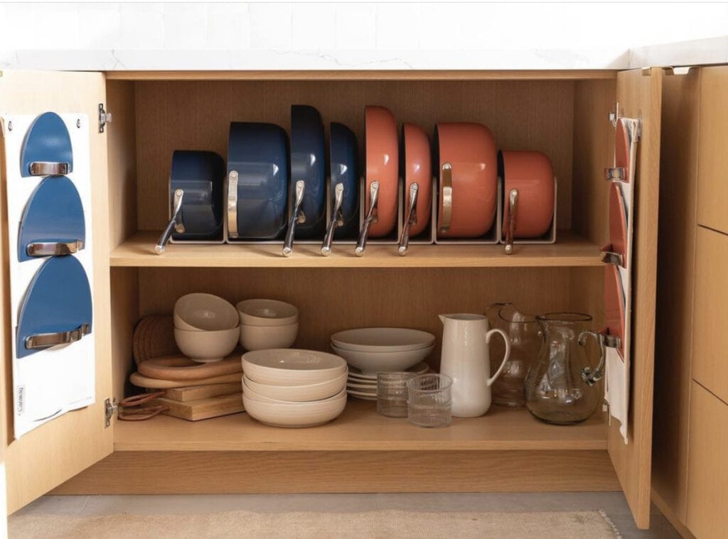 Caraway Cookware in navy and peach 