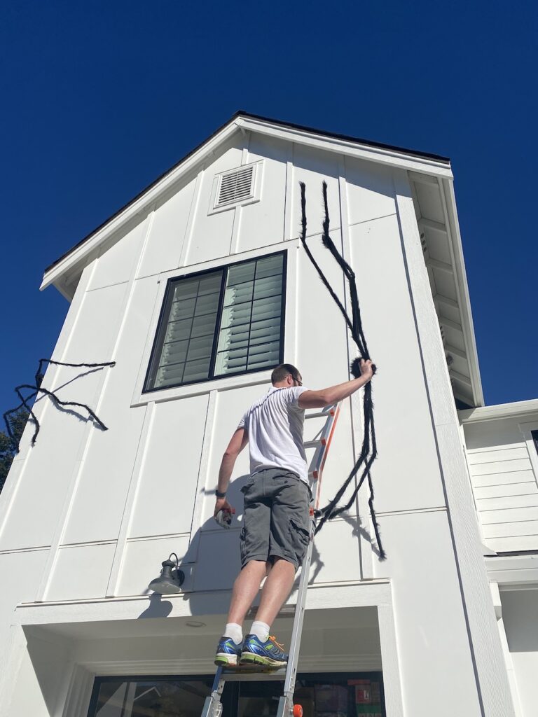 How To Hang Giant Halloween Spiders on Your House!