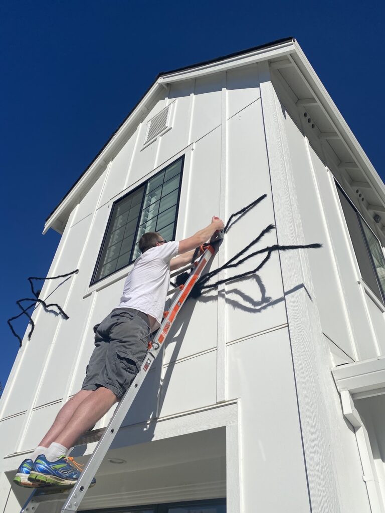 How To Hang Giant Halloween Spiders on Your House!